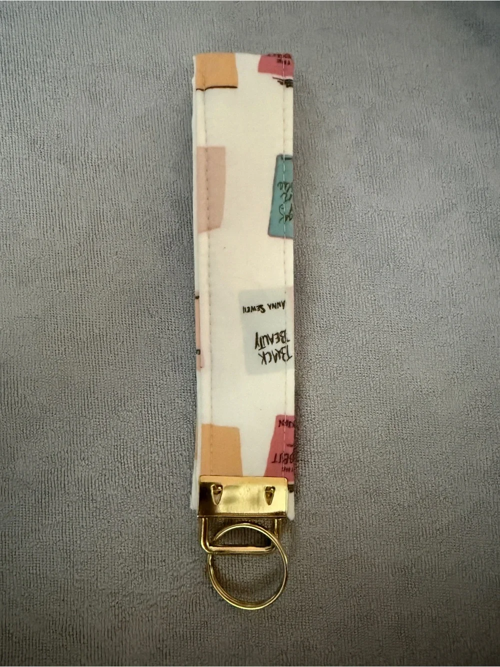 Book Print Wristlet Keychain - Cream with Pastel Blocks
